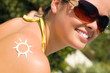 A sun made with suncream at the shoulder