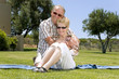 happy old couple enjoying sunny day outdoors