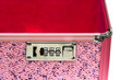pink safe box with padlock