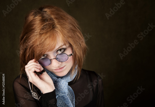 Photo: Pretty Girl with Blue Glasses Pretty Girl with Blue Glasses