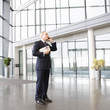 A mature businessman talking on mobile phone