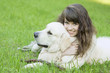 Girl with the golden retriever in the park