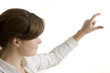 Young woman presenting on white background (focus on the hand) Young woman presenting on white background (focus on the hand)