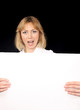 Young woman holding poster
