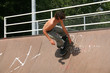 Attractive 16 year old boy on skateboard at skatepark. Attractive 16 year old boy on skateboard at skatepark.