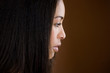 Photo: A young black woman with long dark hair A young black woman with long dark hair