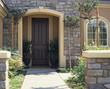 Walkway to Front Door of House with Stone Facade