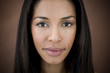 Photo: Portrait of a young black woman with long straight hair Portrait of a young black woman with long straight hair