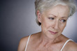 A senior woman crying