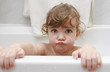 Little girl is taking a bath