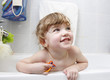 Child is taking a bath