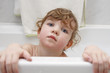 Little girl is taking a bath