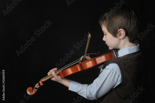 Photo: Boy Playing a Violin Boy Playing a Violin