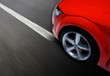 Fast sports car moving with blur