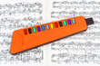 Toy pipe and sheet music