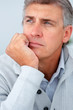Closeup of a mature business man looking away