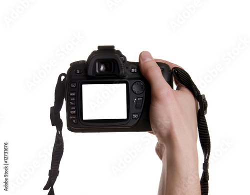 Photo camera in hand