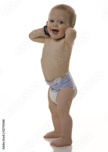 Photo: Happy Baby Boy Talking on Cell Phone Happy Baby Boy Talking on Cell Phone