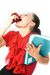 young businesswoman eating an apple young businesswoman eating an apple