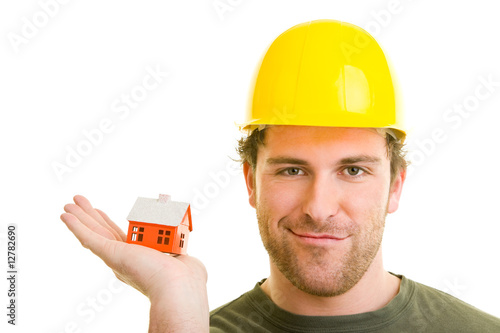 Bauarbeiter mit Haus