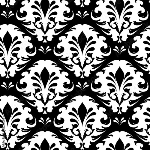 Royalty-free clipart picture of a black and white vintage ornate floral and