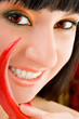 cute girl with chili pepper
