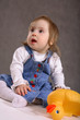 Cute handicapped girl with toy