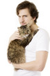Man who keeps on hand fluffy cat