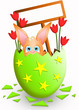 Illustration: Little rabbit hiding inside a green Easter egg Little rabbit hiding inside a green Easter egg