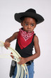 child cowboy holding a rope