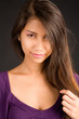 Beautiful Brunette Lady Posing in a Purple Dress