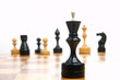Some chessmen on a chessboard, white background