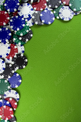 Many poker chips on casino table