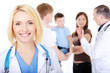 Smiling female doctor with the young family