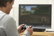 Photo: Man Playing With Game Console Man Playing With Game Console