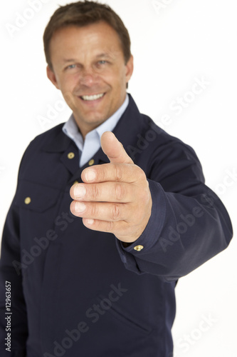 Photo: Courier Extending His Hand For A Handshake, Smiling Courier Extending His Hand For A Handshake, Smiling