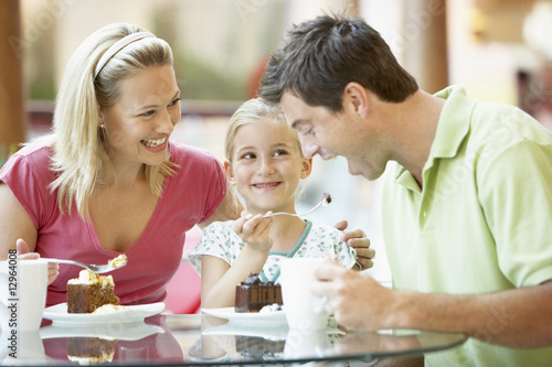 Photo: Family Having Lunch Together At The Mall Family Having Lunch Together At The Mall