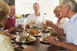 Friends Enjoying Lunch At Home Together