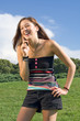 Beautiful Girl Speaking Talking on the Mobile CellPhone Outdoors Beautiful Girl Speaking Talking on the Mobile CellPhone Outdoors