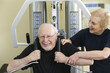 Senior couple exercising in the gym.