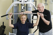 Senior couple exercising in the gym.