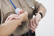 Emergency Medical Service officer checking the pulse