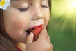 Eating strawberry