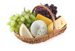 Cheese and grapes in a basket isolated on a white background