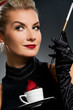 Charming lady with coffee cup and mouthpiece