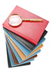 Books and a magnifier Books and a magnifier