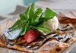 vanilla ice-cream with a baked apple strudel