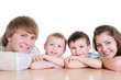 faces of members of young loving family