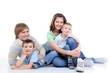 young family of four family enjoing together