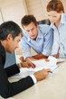 Business people seriously discussing on certain business